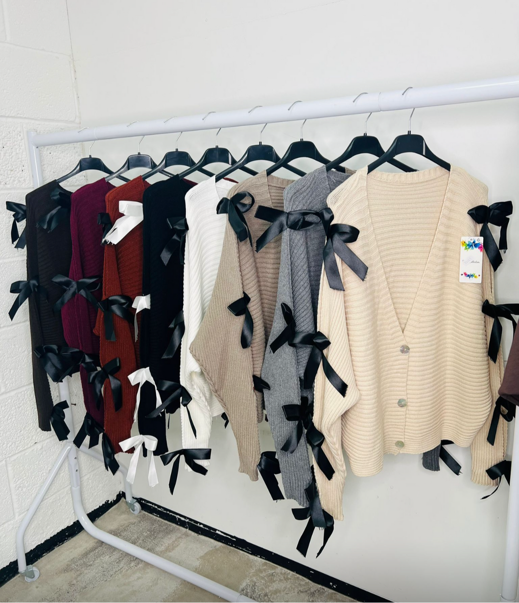 Bow cut out cardigans