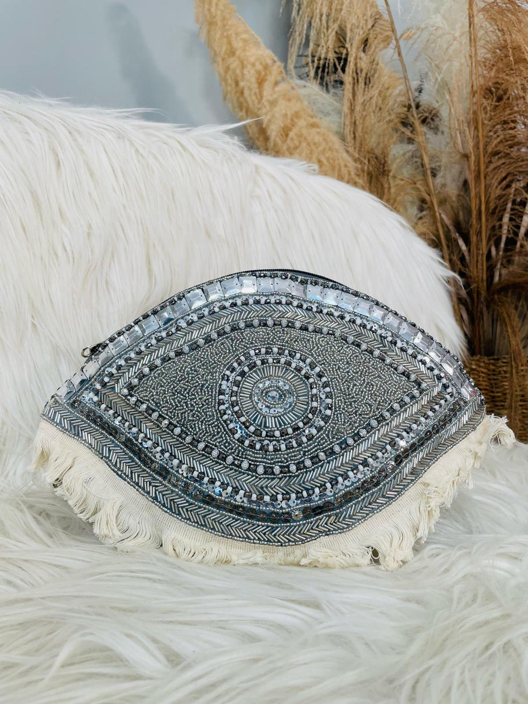 Silver embellished eye clutch