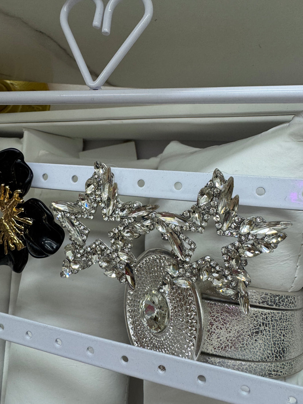 Silver statement star earrings